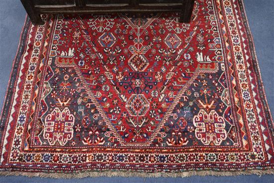 A red and blue ground rug, 260 x 160cm